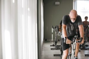 Man riding spin bike